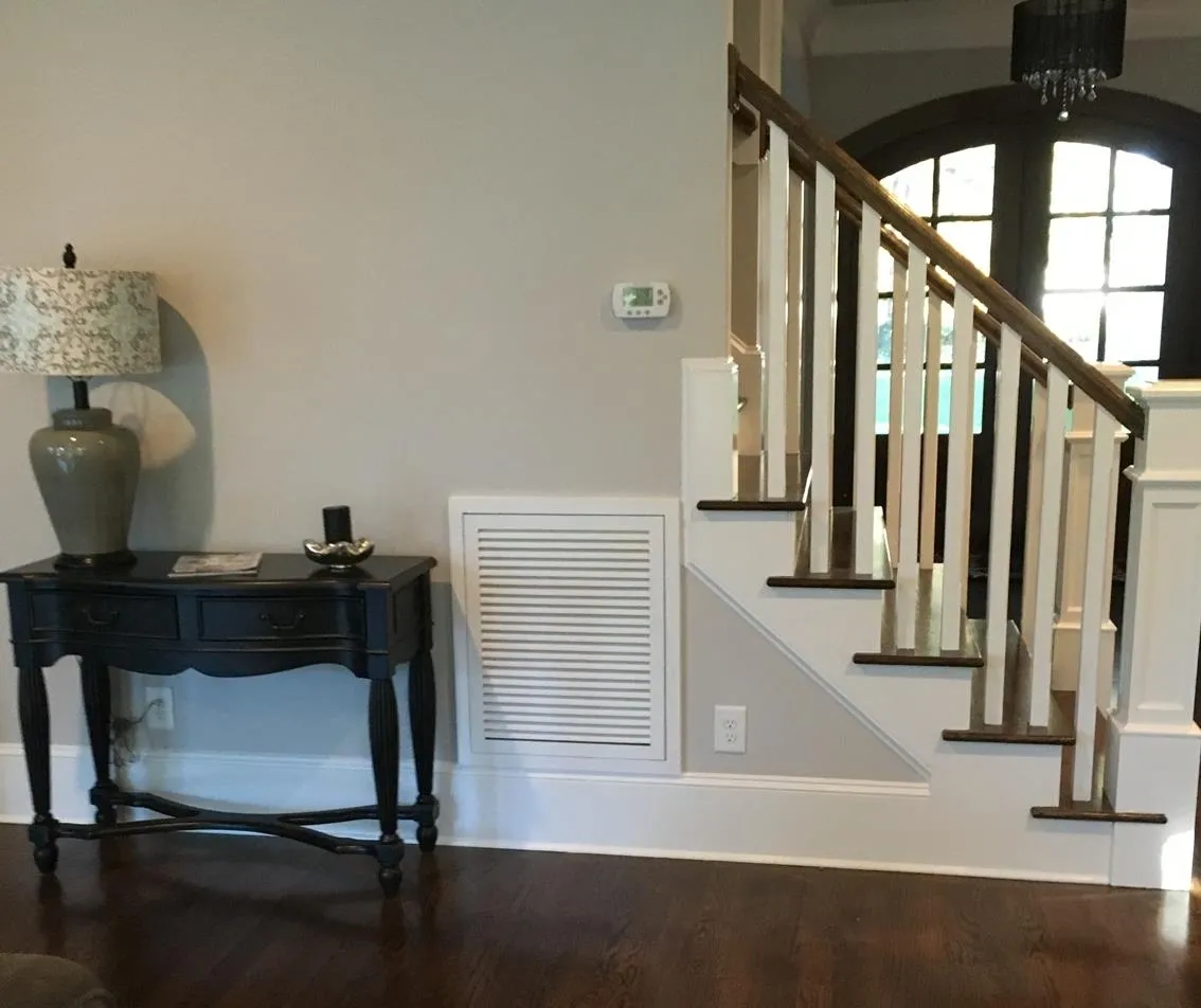 A room with a table and chair in it
